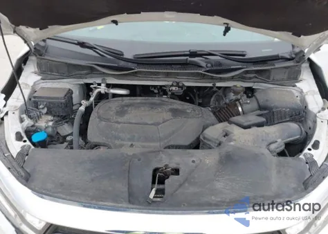 2023 Honda Odyssey Touring from USA, damaged, VIN 5FNRL6H85PB504504